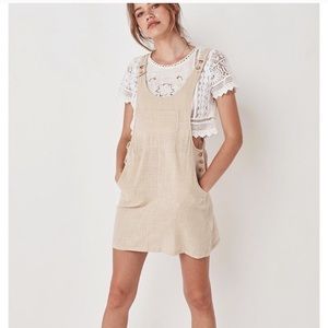 Spell Della Pinafore In Sand - image 1